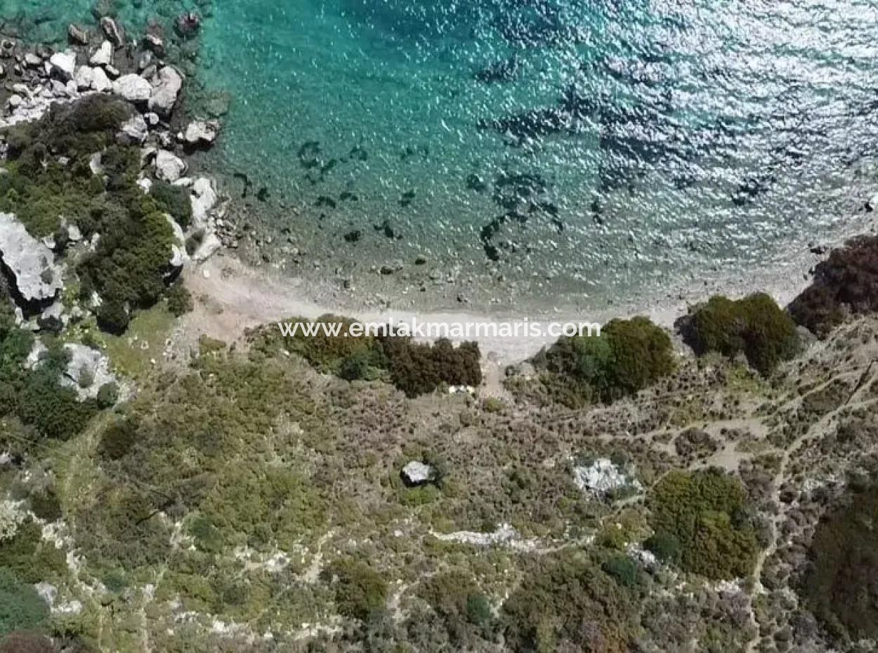 Grundstück Mit Meerblick Zum Verkauf Im Dorf Söğüt Im Bezirk Marmaris, Geeignet Für Investitionen 50 Meter Vom Meer Entfernt