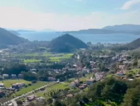 Grundstück Zum Verkauf Im Dorf Marmaris Hisarönü In Einem Wohngebiet Von 2200 M2 Mit Meerblick