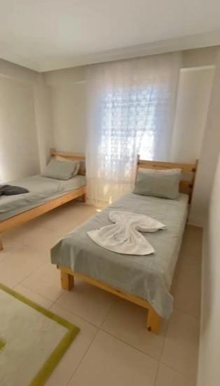 2+1 Furnished Apartment For Rent In Beldibi Neighborhood, With Private Entrance And Garden.