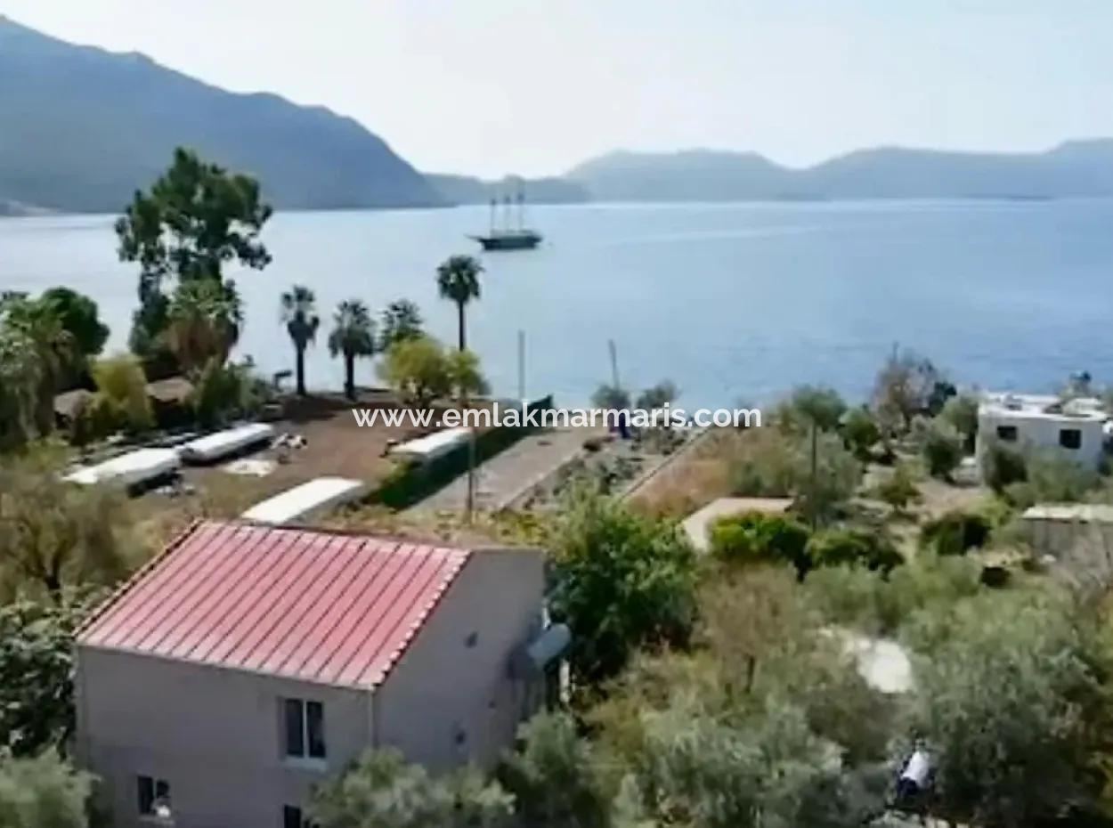 Detached House For Sale On 2000M2 Plot Of Land By The Sea In Marmaris Söğüt Neighborhood. Suitable For Tying A Boat In Front Of It.
