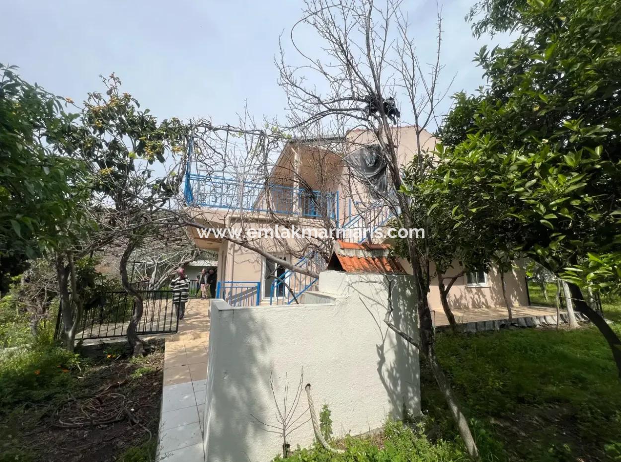 Marmaris Söğüt Mahallesi Denize Sıfır 2000M2 Arsa Satılık Müstakil Ev.önüne Tekne Bağlamaya Uygun.