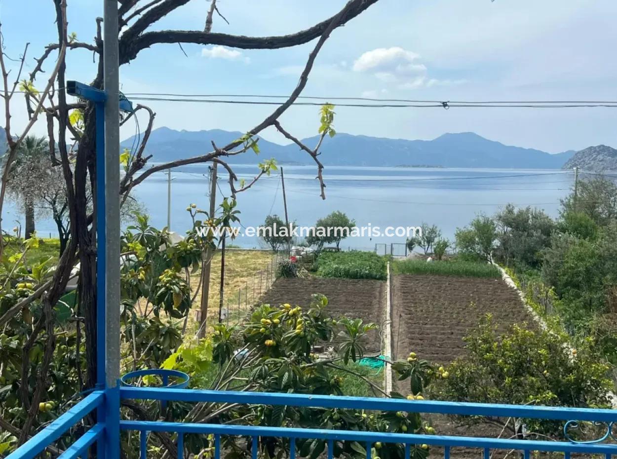 Marmaris Söğüt Mahallesi Denize Sıfır 2000M2 Arsa Satılık Müstakil Ev.önüne Tekne Bağlamaya Uygun.