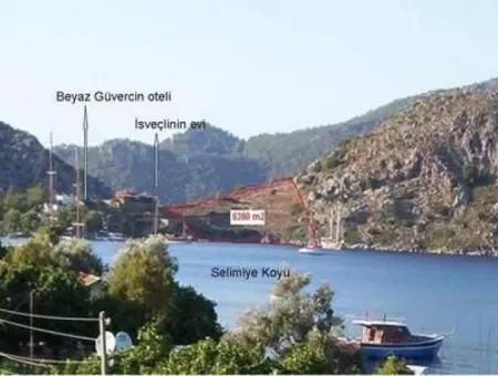Selimiye Koyu İçinde Denize Sıfır 5500M2 Butik Otel Arsamız Satılıktır.